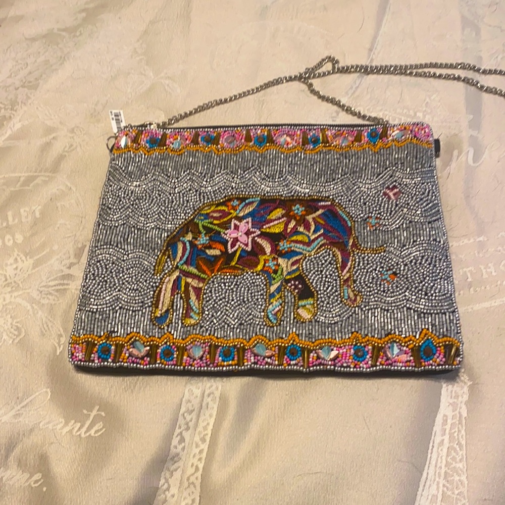 Excellent never used condition. Over the shoulder sequined hand bag.